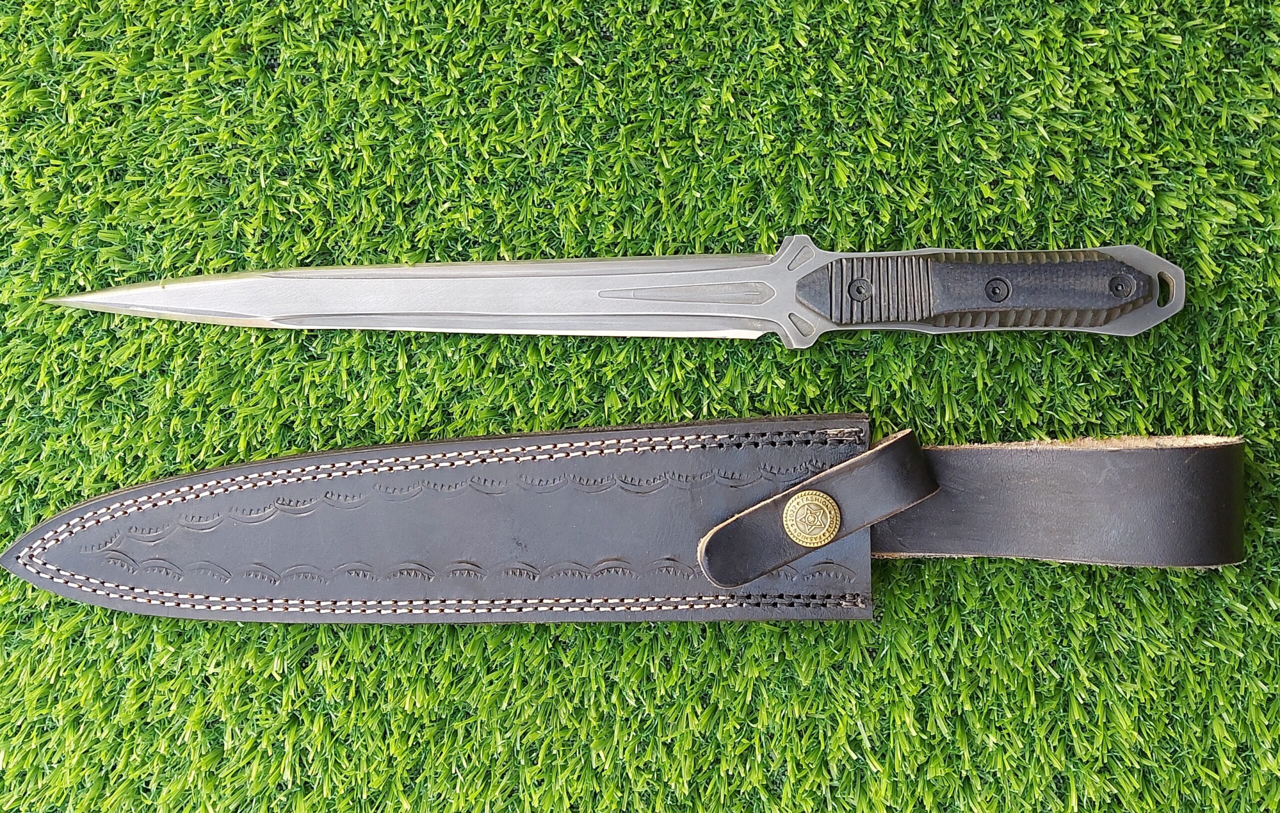 The handmade stainless steel stiletto knife features an intricately acid-washed blade, offering a unique, rugged appearance while maintaining superior sharpness and durability for precise, tactical use. - Image 7