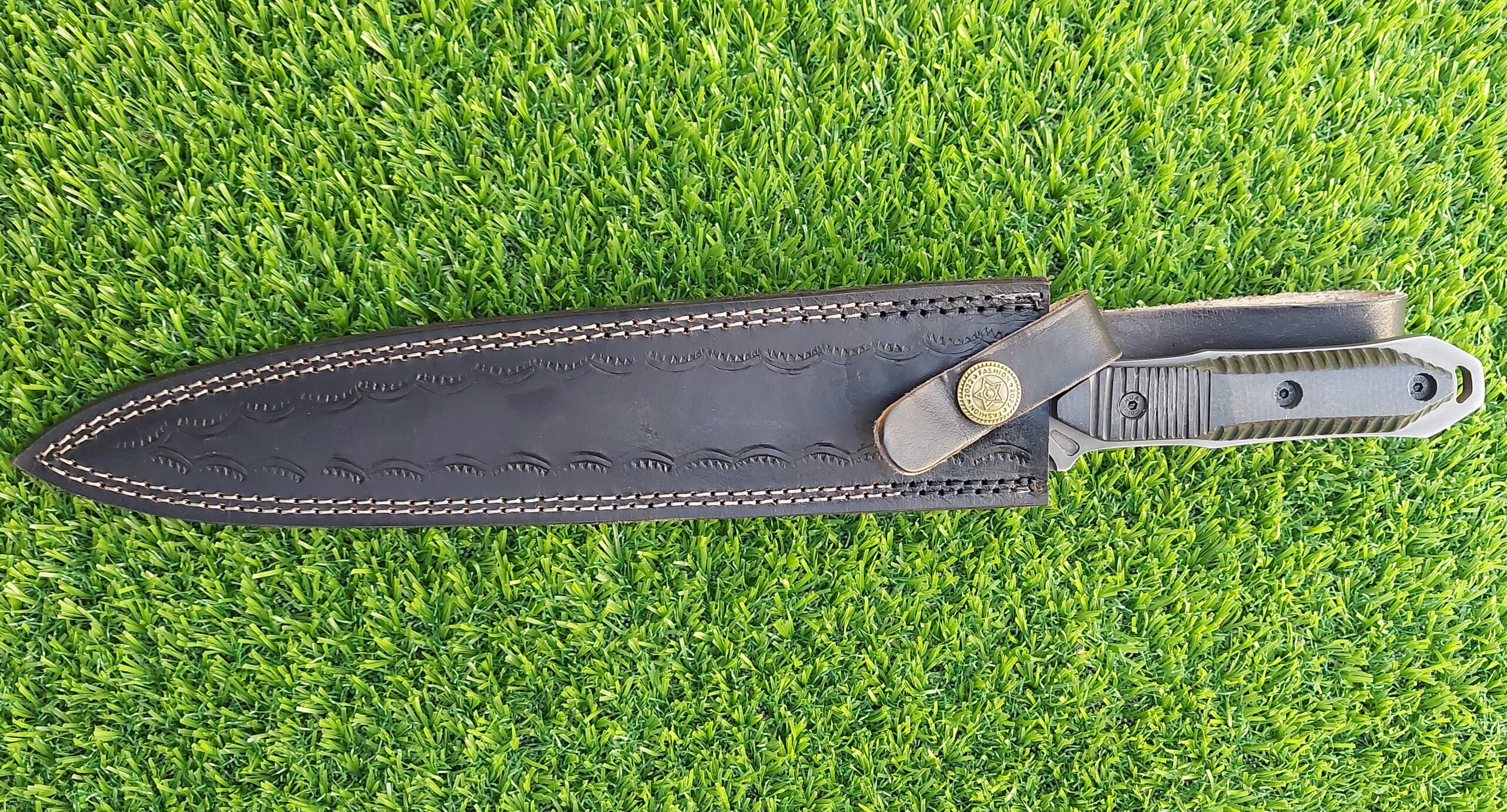 The handmade stainless steel stiletto knife features an intricately acid-washed blade, offering a unique, rugged appearance while maintaining superior sharpness and durability for precise, tactical use. - Image 8