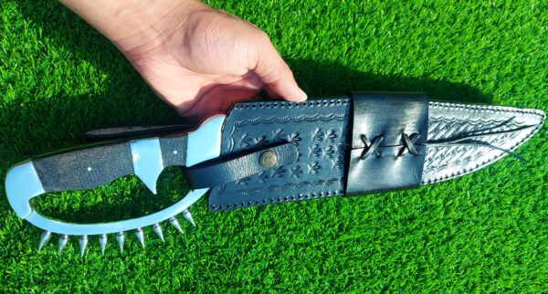 The handmade stainless steel hunting knife features a **D guard** for hand protection and **pins on the guard** for added durability. - Image 4