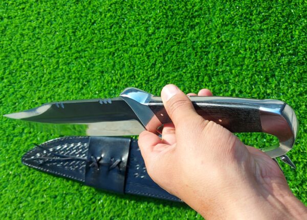 The handmade stainless steel hunting knife features a **D guard** for hand protection and **pins on the guard** for added durability. - Image 7