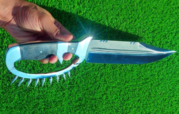 The handmade stainless steel hunting knife features a **D guard** for hand protection and **pins on the guard** for added durability. - Image 12