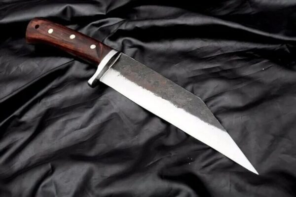 "Experience the perfect blend of ancient craftsmanship and modern durability with our Handmade Stainless Seax Knife, designed for the discerning adventurer." - Image 4