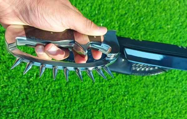 The handmade stainless steel hunting knife features a **D guard** for hand protection and **pins on the guard** for added durability. - Image 2