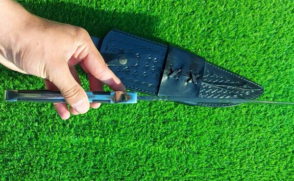 The handmade stainless steel hunting knife features a **D guard** for hand protection and **pins on the guard** for added durability. - Image 17