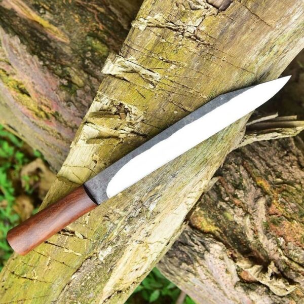 "Experience the perfect balance of tradition and innovation with our Handmade Premium Quality Stainless Seax Knife, designed for durability, precision, and timeless style." - Image 4