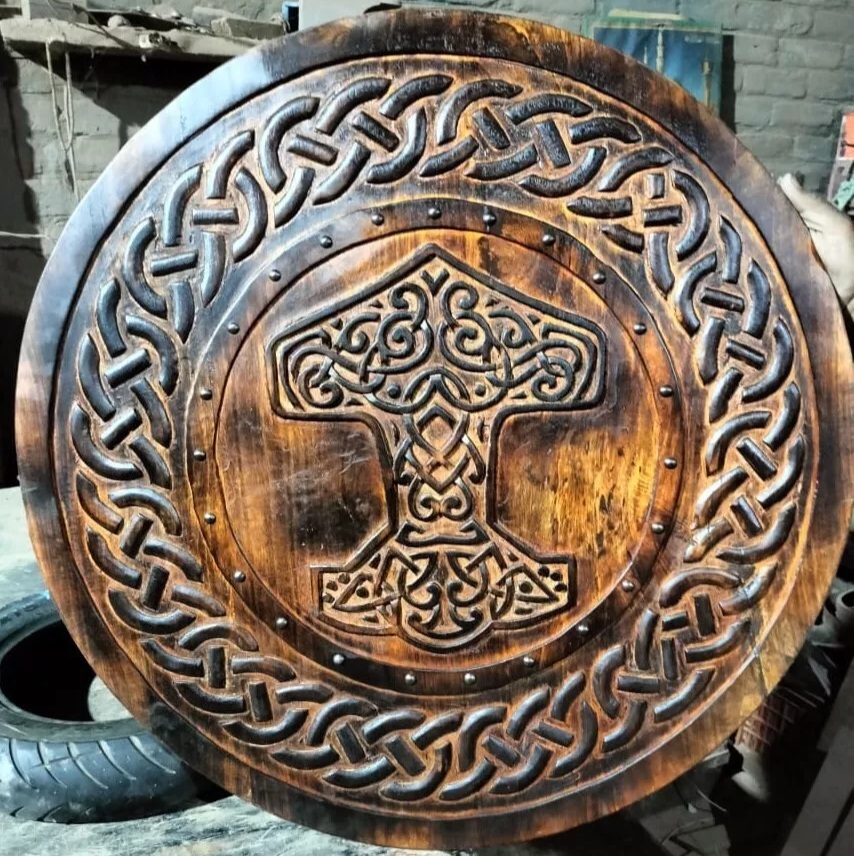 "Carved Hammer of Thor Mjölnir Knotwork Viking Shield: A Powerful Norse Design Featuring Intricate Symbolism and Viking Heritage"