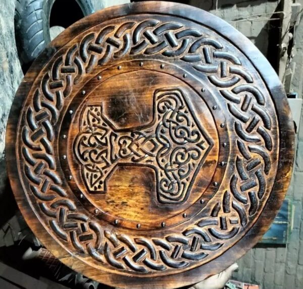 "Carved Hammer of Thor Mjölnir Knotwork Viking Shield: A Powerful Norse Design Featuring Intricate Symbolism and Viking Heritage"